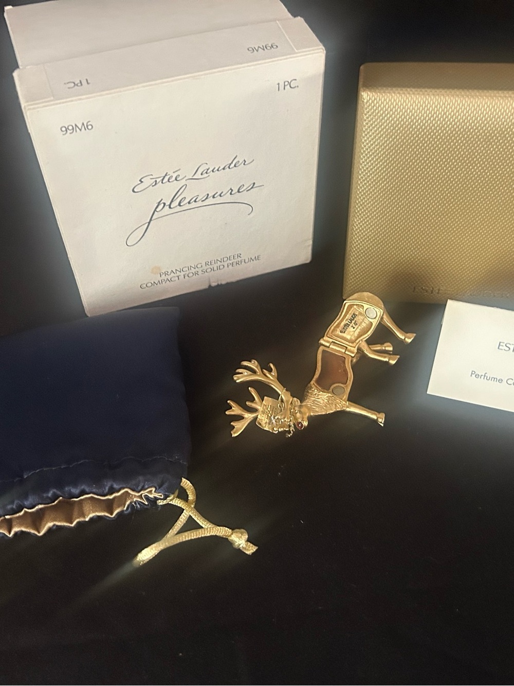 Beautiful Estée Lauder Pleasures Prancing Reindeer solid perfume compact from th